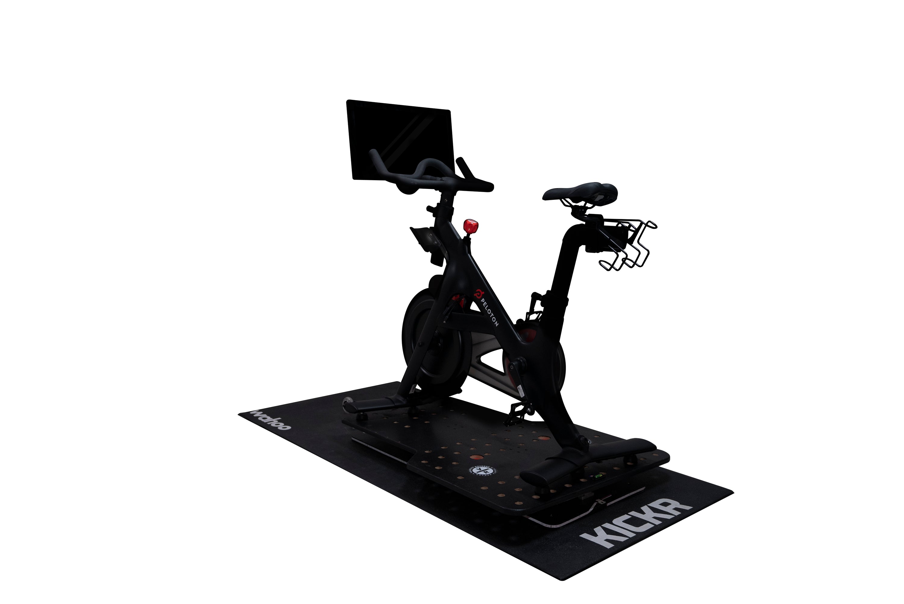 Peloton spin bike attached to the Delta RS rocker plate, the best rocker plate for Zwift Rides and any bike without need for extension plate.