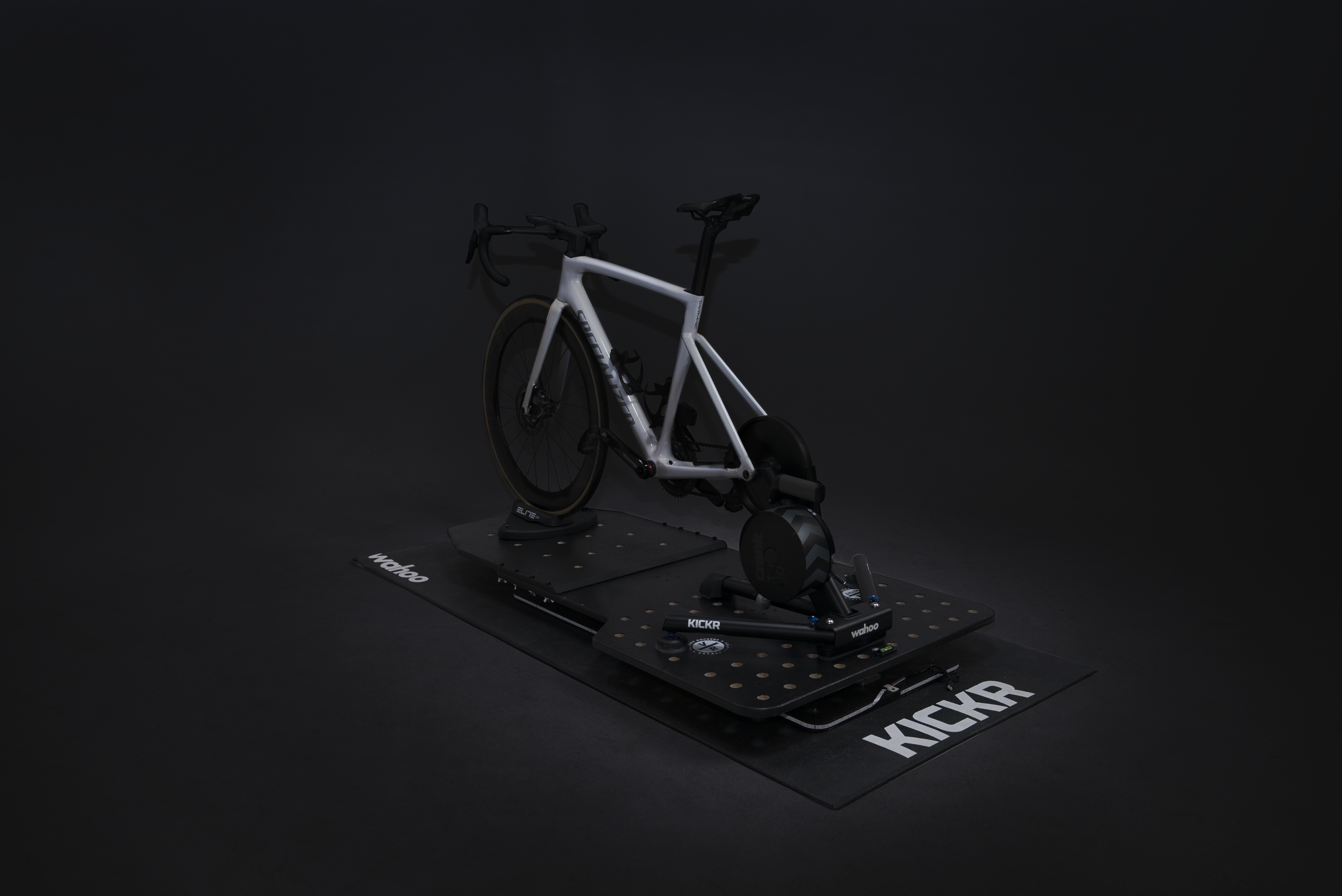 Wahoo KICKR indoor trainer on Delta RS Rocker Plate with full-motion movement for realistic Zwift rides and indoor cycling